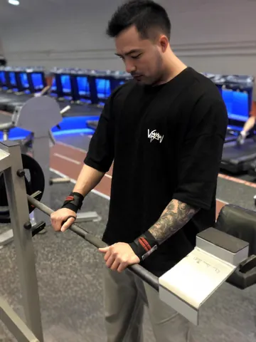 T-Shirt de Gym Oversize pour Hommes en Coton Respirant Top Athlétique Épaule Tombante Impression Graphique Entraînement Streetwear