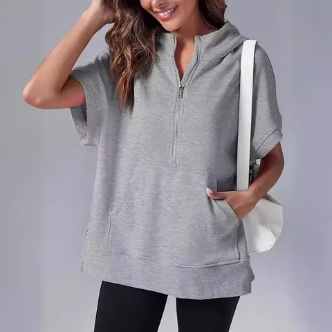 Women's Polyester Short Sleeve Hooded Sweatshirt Half Zip Casual Solid Color Hoodie Pullover Top With Kangaroo Pocket