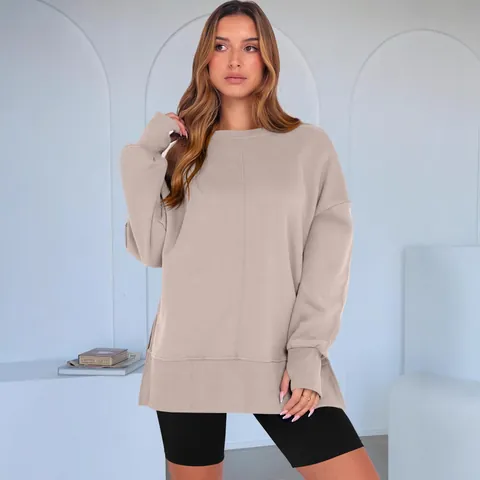 Sweat-shirt Oversize Col Rond pour Femmes Décontracté Manches Longues Fente Latérale Couleur Unie Pull Mode Ample Automne Hiver