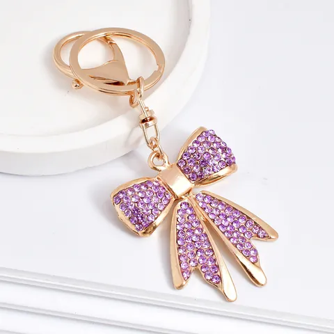 Porte-clés Nœud Papillon en Strass Mode pour Femmes Alliage de Zinc Plqué Or Nœud Porte-clés Charme de Sac Pendentif Voiture Cadeau