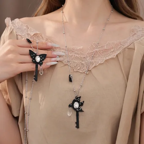 Cool Alloy Black Butterfly Swallow Key Pendant Necklace Vintage Rhinestone Glass Water Drop Sweater Chain Jewelry For Women