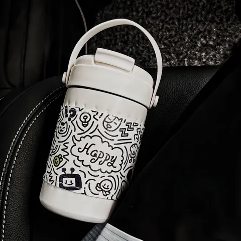Bouteille d'eau Isotherme en Acier Inoxydable avec Graffiti de Dessin Animé Manchon en Cuir Tasse à Café Portable et Couvercle à Poignée pour Extérieur Voiture Bureau Étudiants