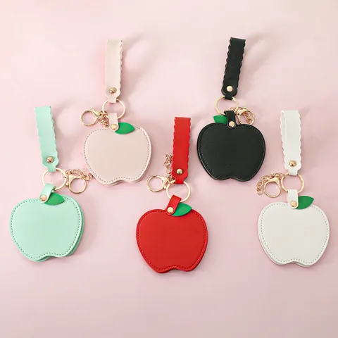 Creative Apple Shape PU Leather Portable Makeup Mirror Keychain For Women Bag Charm Simple Fruit Folding Pocket Mirror Accessory