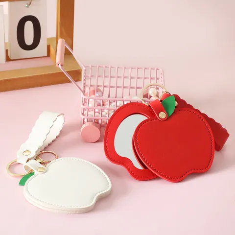 Creative Apple Shape PU Leather Portable Makeup Mirror Keychain For Women Bag Charm Simple Fruit Folding Pocket Mirror Accessory