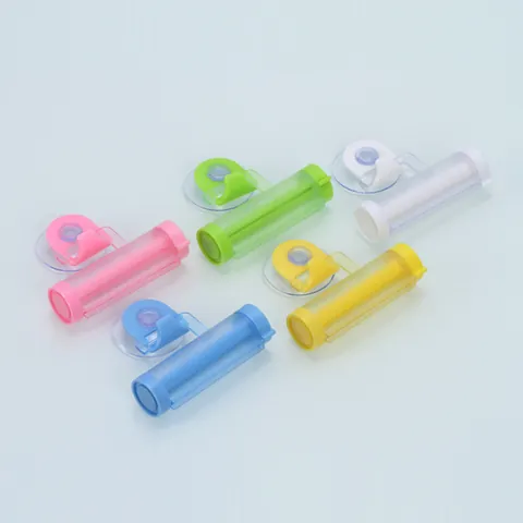 Creative Manual Rotary Toothpaste Squeezer With Suction Cup Hook PP Plastic Rolling Toothpaste Tube Dispenser Bathroom Storage Rack Organizer