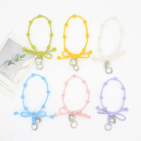 Fresco Dulce Lazo Tejido Cordón para Teléfono Correa de Muñeca Con Colgante de Corazón Anti-Pérdida Hecho a Mano de Cuero Cadena para Teléfono Móvil Accesorios de Dije para Bolso