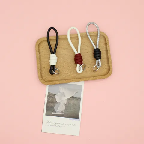 Minimalist Braided PU Leather Keychain Wristlet Strap for Bag DIY High-End Knot Pendant Key Ring Charm with Metal Loop