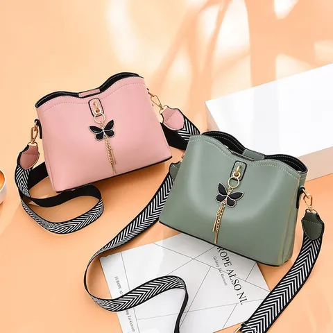 Women's Fashion PU Leather Bucket Bag with Butterfly Metal Tassel Wide Chevron Strap Vintage Soft Shoulder Crossbody Bag For Women