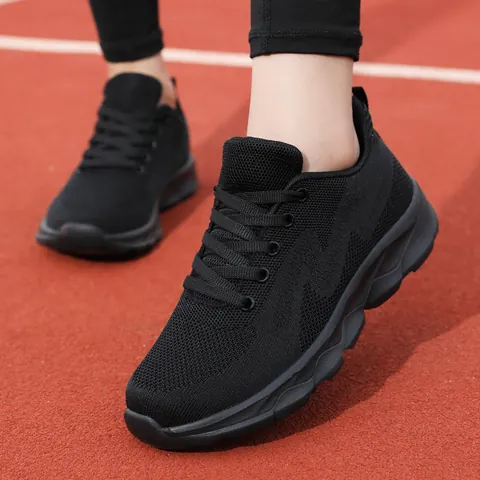 Baskets en Maille Respirante pour Femmes Chaussures de Course Tissées Volantes Chaussures de Sport Plates Décontractées