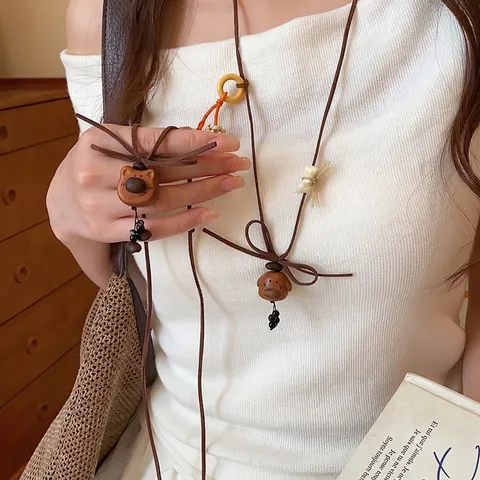 Lindo Collar con Colgante de Perro Oso de Madera Cuerda de Terciopelo Coreano Grano de Café Lazo Cadena para Suéter Collar Largo Retro