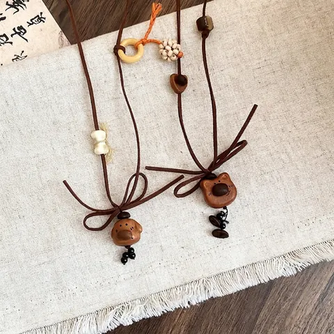Lindo Collar con Colgante de Perro Oso de Madera Cuerda de Terciopelo Coreano Grano de Café Lazo Cadena para Suéter Collar Largo Retro