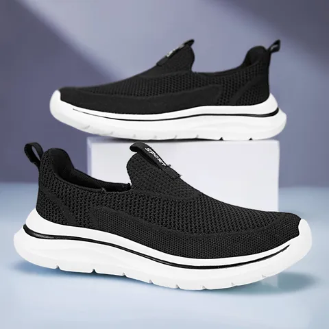 Chaussures de Marche Fly-knit pour Femmes Respirantes Légères Baskets Plates en Maille Chaussures de Sport Décontractées Quotidiennes
