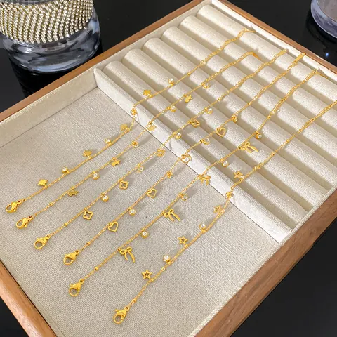 Bracciale Minimalista in Acciaio al Titanio con Trifoglio e Fiori da Donna Placcato Oro 18K Strass Cuore Stella Fiocco Bracciale a Maglie Gioielli Regalo