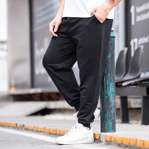 Men's Plus Size Casual Sweatpants Elastic Waist Drawstring Joggers Cuffed Hem Solid Color Cotton Blend Sports Trousers