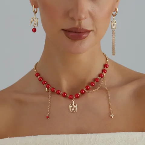 Europäischer Stil Eisen Legierung Hohl Flügel Totem Halskette Ohrringe Set Rot Künstliche Perle Quaste Mode Schmuckset Für Damen