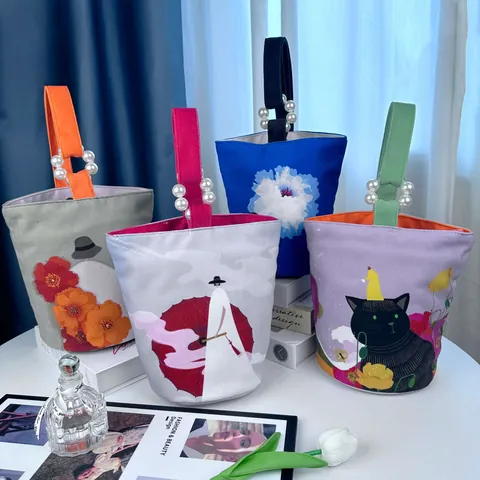 Printed Artistic Nylon Bucket Bag with Pearl Handle Creative Illustration Handbag Elegant Women Handbag For Daily Matching