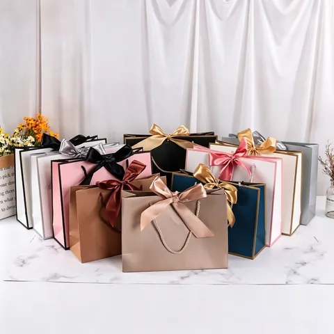 Elegant Paper Gift Bags With Large Ribbon Bow Decor Thick Cardboard Handbags For Wedding Party Favors Boutique Shopping