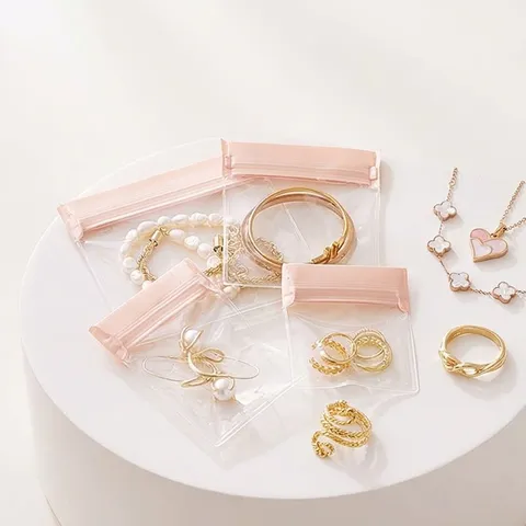 Pochette Bijoux en EVA Transparent Anti Oxydation Rose Scellé Pour Boucles d'Oreilles Bagues Colliers Organisateur de Bijoux Portable