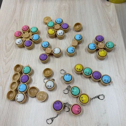 Lichtgevende Kleine Baozi Fidget Spinner Sleutelhanger Stressvermindering Pop It Bubble Cartoon Expressie LED Hanger Voor Kinderen Volwassenen