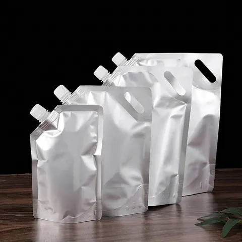Aluminum Foil Stand Up Spout Pouch For Liquid Beverage Reusable Juice Storage Bag Leak Proof Metallic Sealed Packaging Dispenser