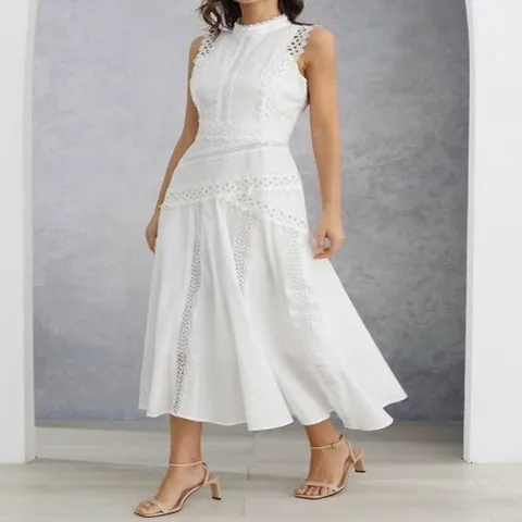 Robe Sans Manches en Dentelle Ajourée Style Français Robe de Soirée Élégante en Ligne A Été Femme Robe Maxi Unie
