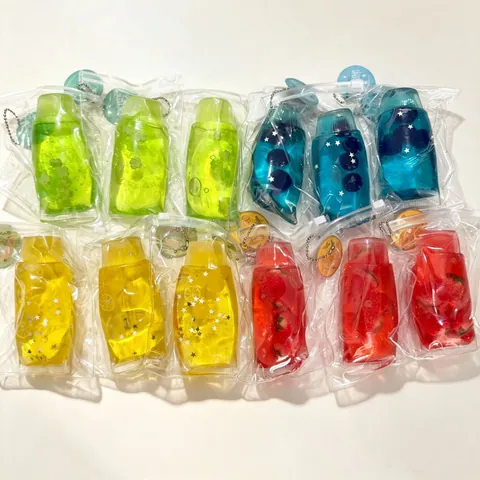 Jouet Squishy en Forme de Dentifrice Transparent Anti-Stress Avec Tranches de Fruits et Remplissage de Vaseline Pour Enfants