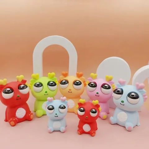 Simpatico Drago del Fumetto Pop-Eye Squishy Giocattolo Antistress Divertente Bambola a Pressione Mascotte del Drago per Bambini Adulti Regalo