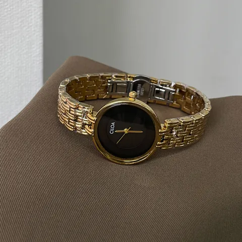 Montre à Quartz Rétro pour Femmes Cadran Minimaliste Bracelet en Maille d'Acier Inoxydable Cuir Mode Vintage Étanche