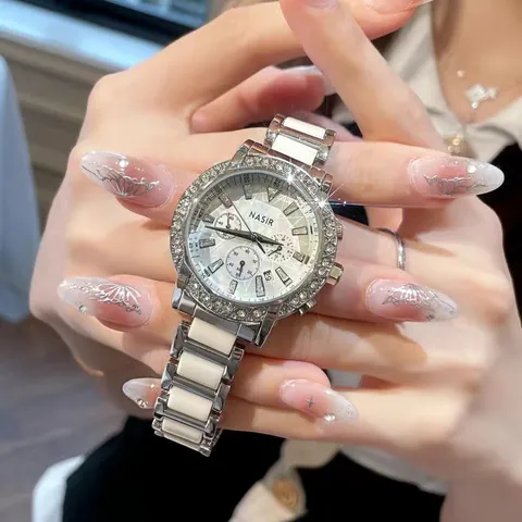 Montre à Quartz NASIR Luxe pour Femme Lunette en Strass Boîtier en Alliage Bracelet en Céramique Cuir Élégante avec Date
