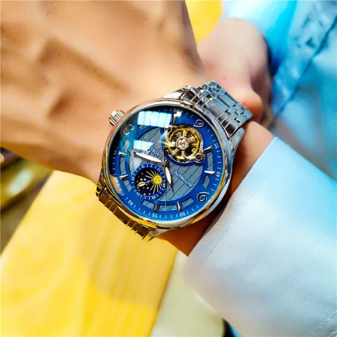 Montre Mécanique Automatique pour Hommes Étanche Lumineuse Business Décontractée Luxe Creux Phase de Lune Acier Cuir Montre-Bracelet pour Hommes