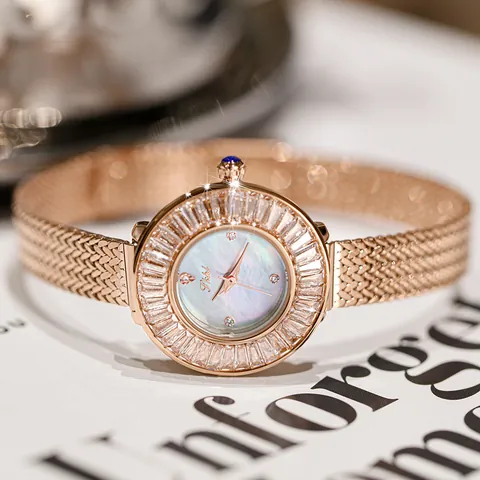 Mode Damen Quarzuhr Mit Strass-Lünette Perlmutt-Zifferblatt Legierung Mesh-Armband Lässig Einfache Runde Analoge Armbanduhr