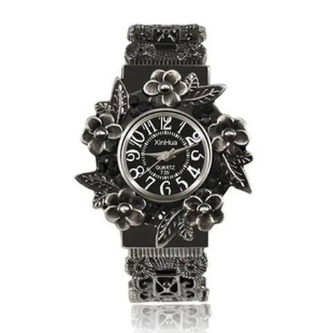 Damen Retro Armreif-Uhr Graviert Floral Legierung Quarz Uhr Antik Silber Boho Hohl Armband Armbanduhr Für Frauen