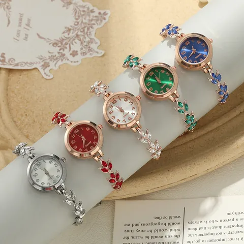Women's Fashion Clover Bracelet Watch Elegant Rhinestone Inlaid Quartz Analog Watch Adjustable Stretch Chain Ladies Wristwatch