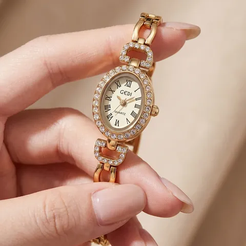 GEDI Women's Luxury Oval Rhinestone Bracelet Watch Retro Roman Numerals Dial Elegant Hollow Alloy Chain Quartz Wristwatch