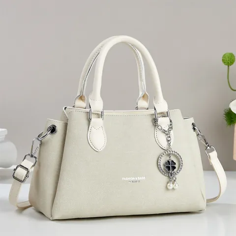 Sac à Bandoulière Minimaliste Patchwork de Couleurs pour Femmes Sac à Main Vintage en Cuir PU avec Pendentif Trèfle et Perle