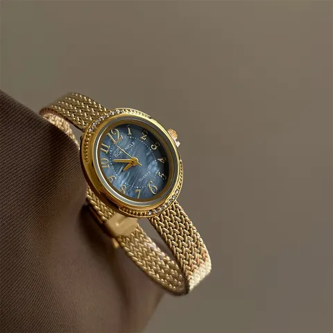 Orologio al Quarzo da Donna alla Moda di Lusso in Lega Cinturino in Maglia Intrecciata Lunetta con Strass Quadrante Ovale Tondo Orologio