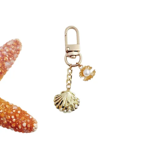 Portachiavi a Forma di Conchiglia Stella Marina Tema Oceano Vintage Perla Artificiale Strass Ciondolo per Borsa Donna Regalo Gioielli