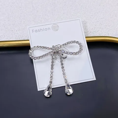 Elegant Bowknot Rhinestone Tassel Brooch For Women Silver Plated Alloy Bow Drip Pendant Lapel Pin Anti-Exposure Dress Accessories
