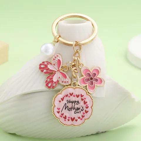 Porte-clés en Alliage Émaillé Papillon Fleur Avec Perle Artificielle Pendentif de Sac Cadeau Fête des Mères pour Femmes Maman Pendentifs