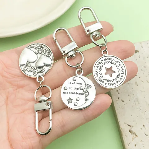 Inspirierende Zitate Antiksilber Legierung Schlüsselanhänger Herz Stern Mond Brief Anhänger Tasche Charme Kreatives Geschenk Modeschlüsselring