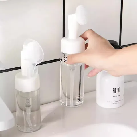Tragbare Schaum-Spenderflasche Mit Silikon-Massagebürstenkopf Transparenter Druck-Reinigungsschäumer Für Gesichtswasser