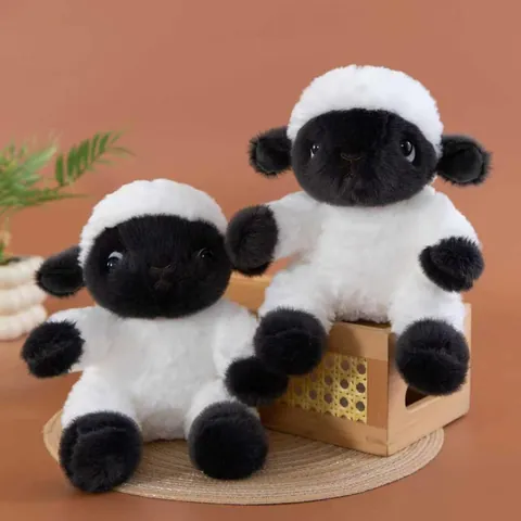 Simpatico Peluche a Forma di Pecora dal Muso Nero in Morbido Poliestere Bambola Ollie per Decorazione Domestica Regalo Lenitivo per Bambini
