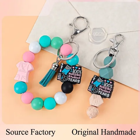 Llavero de Pulsera de Silicona con Cuentas Creativo Pendiente de Bolso Con Borla de PU Uniforme de Enfermera Gráfico Médico Cita Llavero para Mujeres Regalo