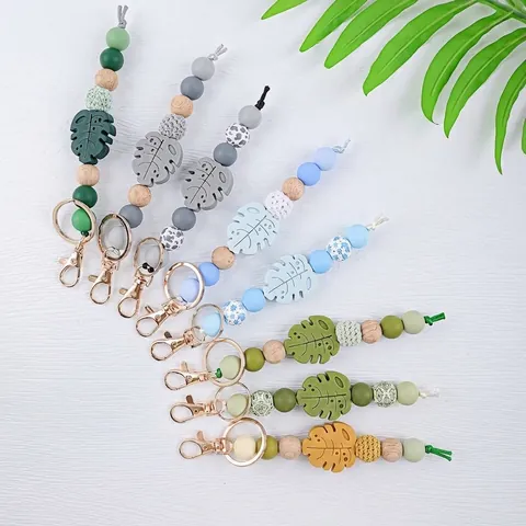 Silicone Beaded Monstera Leaf Keychain For Women Wood Bead Cotton Knitted Charm Bag Pendant Car Key Ring Accessory