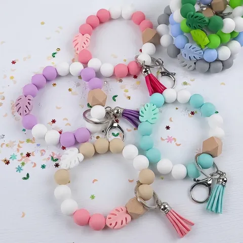 Handmade Silicone Beaded Tassel Keychain Bracelet Wood Bead Monstera Leaf Charm Wristlet Bag Pendant Key Ring For Women