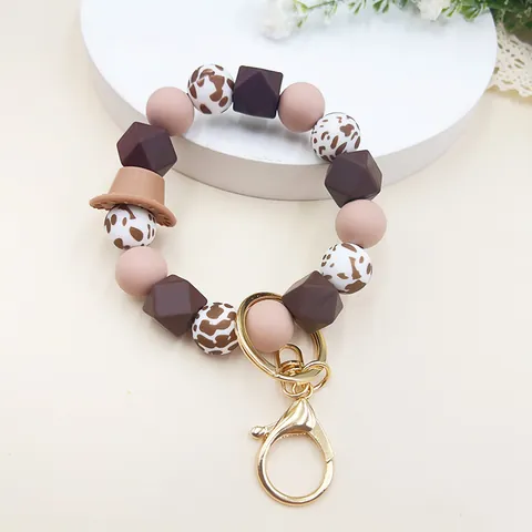 Western Stijl Siliconen Kralen Armband Sleutelhanger Met Cowboyhoed Hanger Luipaard Koe Print Pols Sleutelring Voor Dames