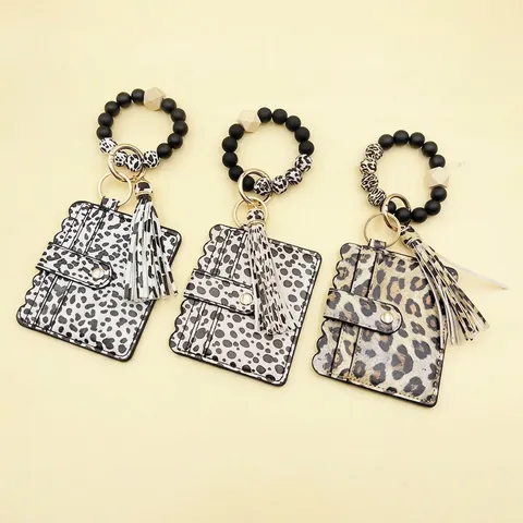 Llavero con Porta Tarjetas Estampado de Leopardo Pulsera de Cuentas de Silicona con Borla Pulsera de Cuero PU Llavero para Mujer Regalo