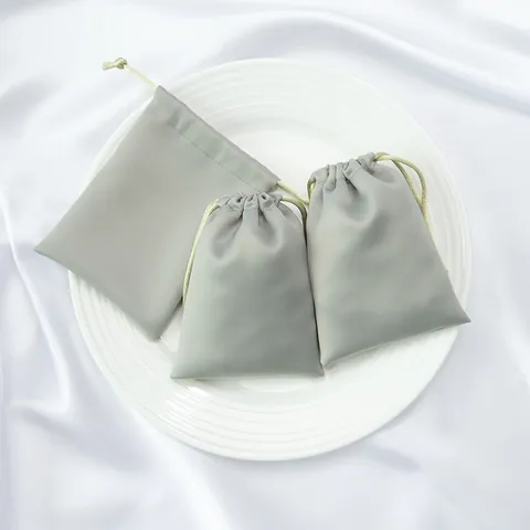 Sac à Cordon Plissé en Satin de Luxe Pochette à Bijoux Minimaliste Couleur Unie Sac de Rangement Cosmétique Portable Pour Cadeau