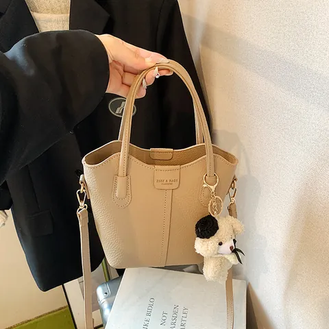 Women Minimalist PU Litchi Texture Bucket Bag Versatile Small Handbag Single Shoulder Crossbody Bag With Plush Charm Accessory