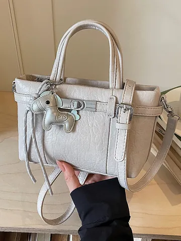 High-End Damen PU Leder Eimertasche Urban Pendler Handtasche Einfarbig Mit Silberschloss Und Tier Anhänger Umhängetasche